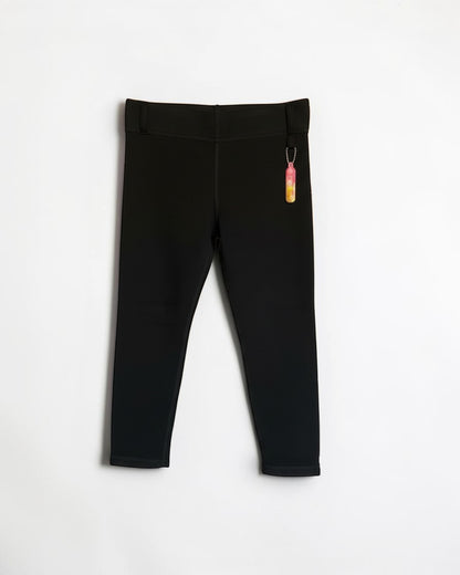 Sensitive Little Souls black fleece-lined adaptive leggings with adjustable waist and fidget loop.