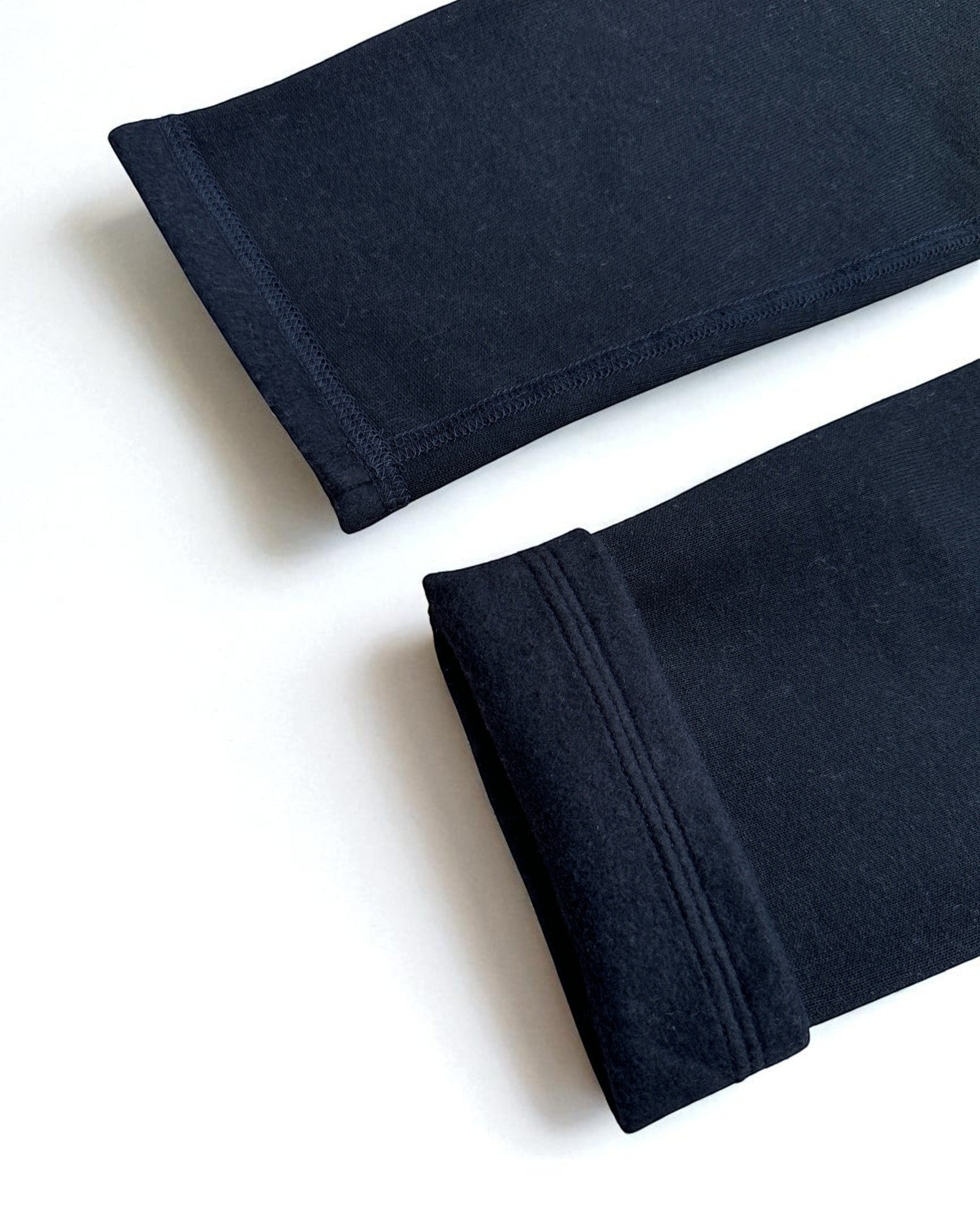 Sensitive Little Souls black fleece-lined joggers with adjustable waist and tag-free comfort.