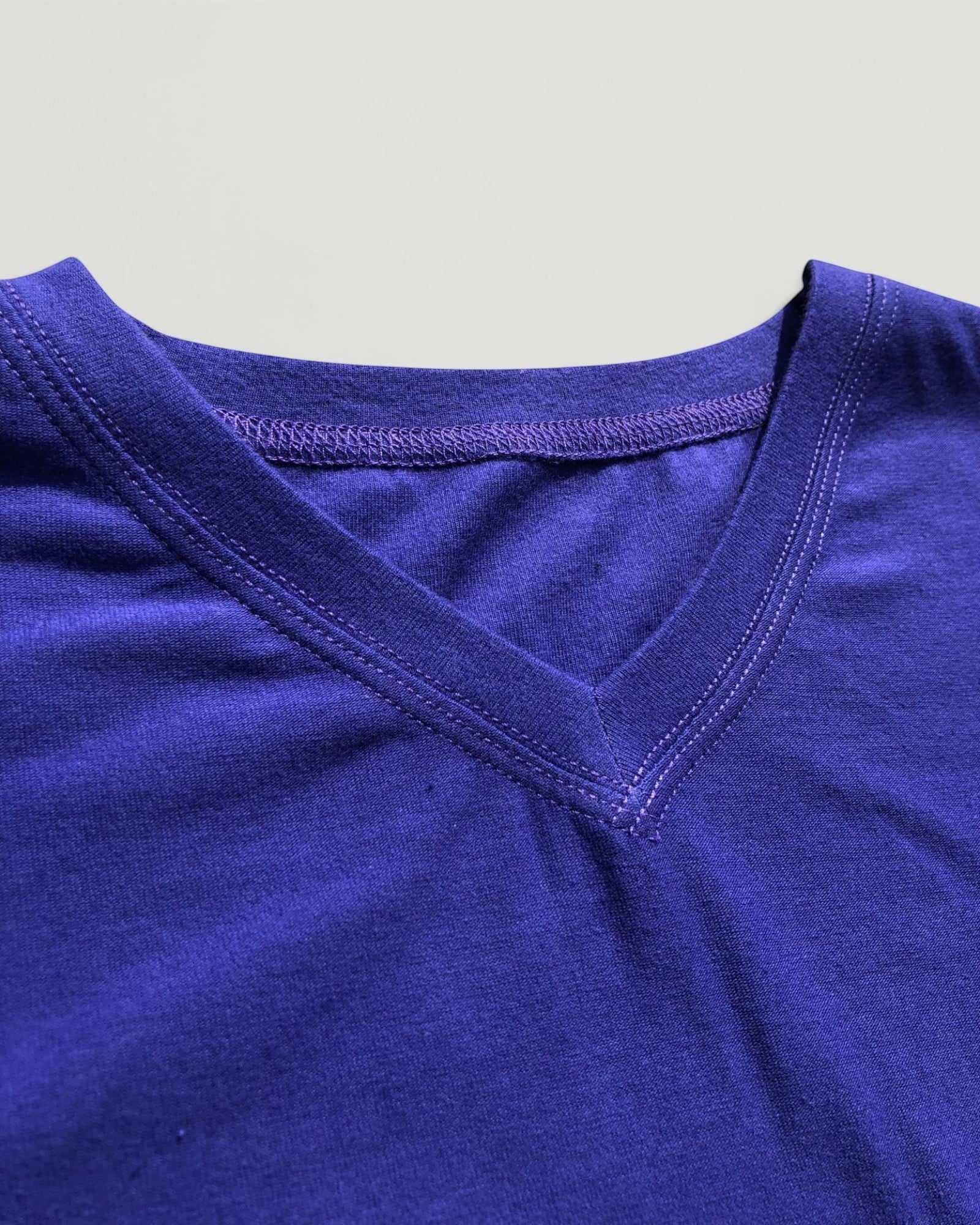 Sensitive Little Souls blue long sleeve t-shirt with V-neck and flat seams, designed for comfort and sensory needs.