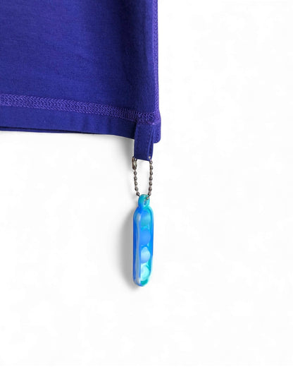 Sensitive Little Souls blue long sleeve t-shirt with a fidget loop and blue popper toy attached.