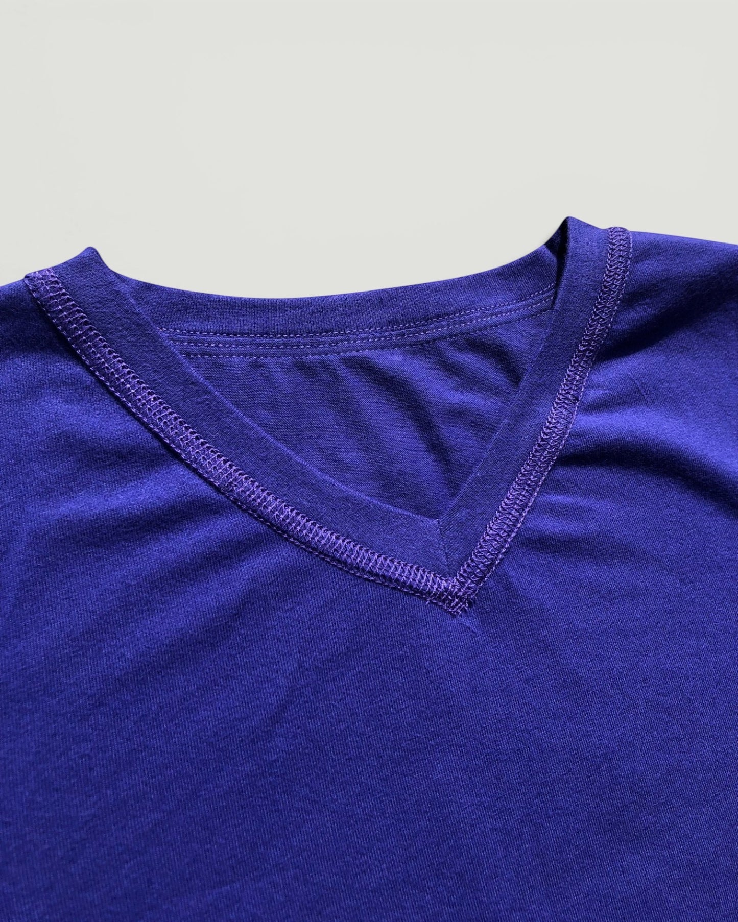 Sensitive Little Souls kids' long sleeve t-shirt in royal blue, made from a cotton blend with flat seams and a V-neck.