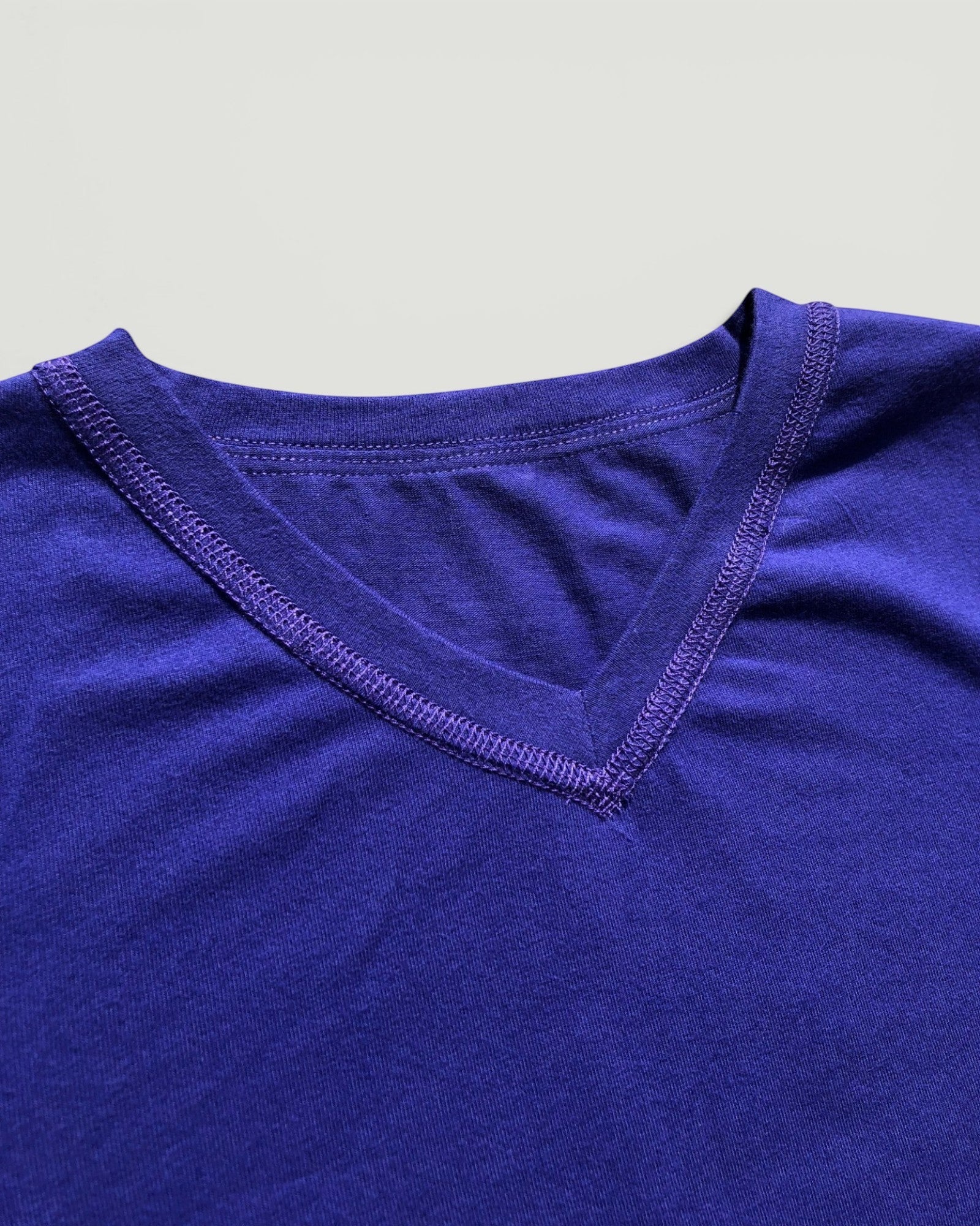 Sensitive Little Souls kids' long sleeve t-shirt in royal blue, made from a cotton blend with flat seams and a V-neck.