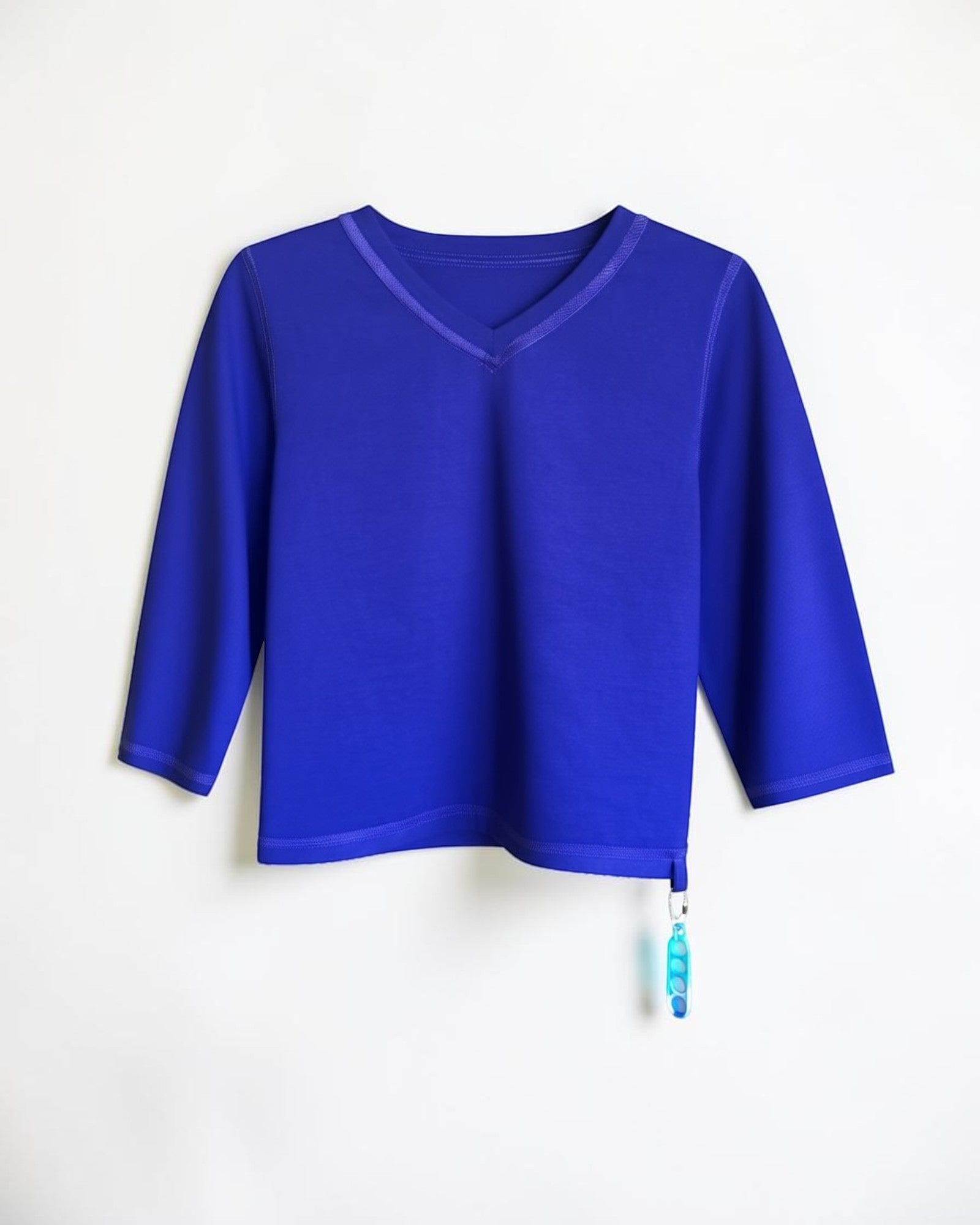 Sensitive Little Souls blue long sleeve t-shirt with V-neck, flat seams, and a fidget loop on the hem.