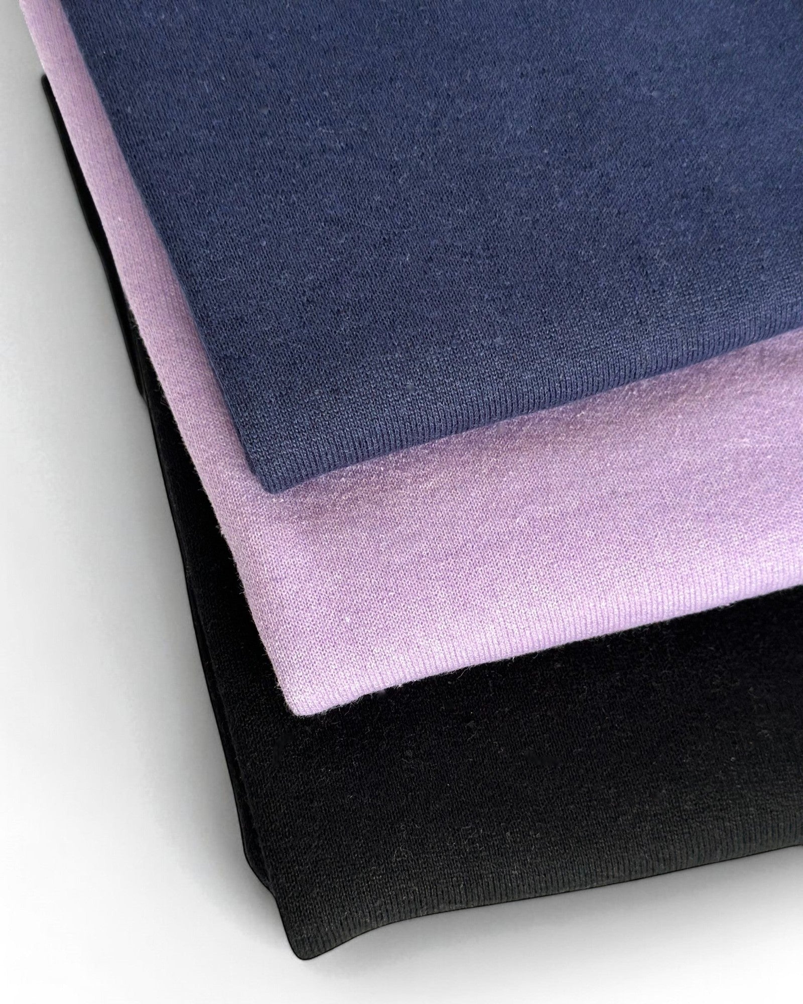 Sensitive Little Souls lilac, navy, and black fleece-lined adaptive leggings with adjustable waist and fidget loop.