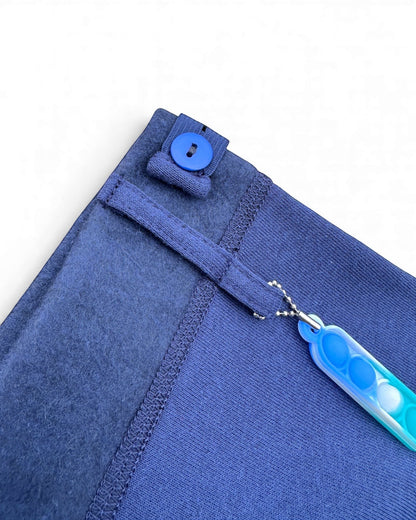 Sensitive Little Souls navy fleece-lined adaptive leggings with adjustable waist and fidget loop. Tagless.
