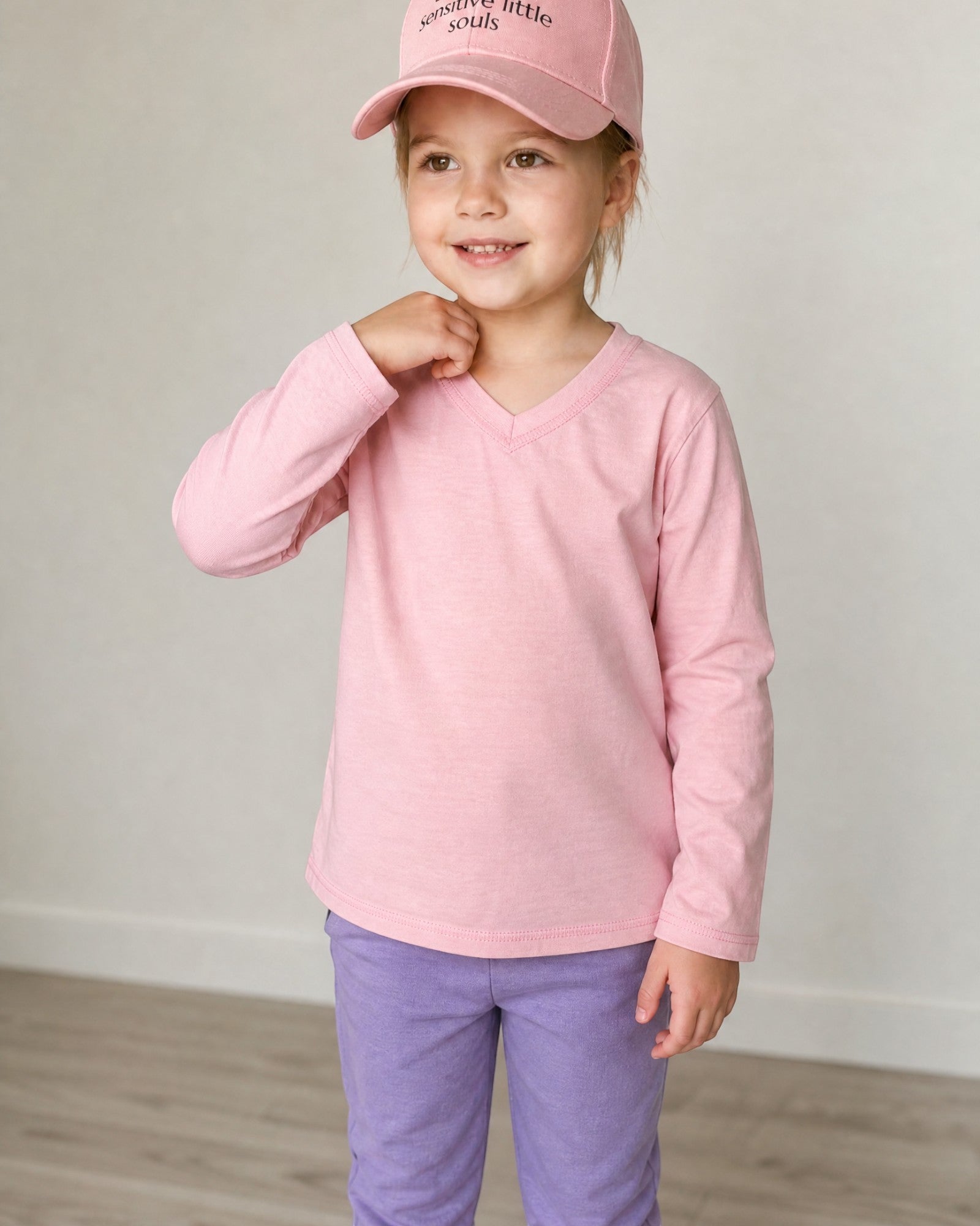 Sensitive Little Souls pink long sleeve t-shirt with V-neck and fidget loop, made from cotton blend for kids with SPD.