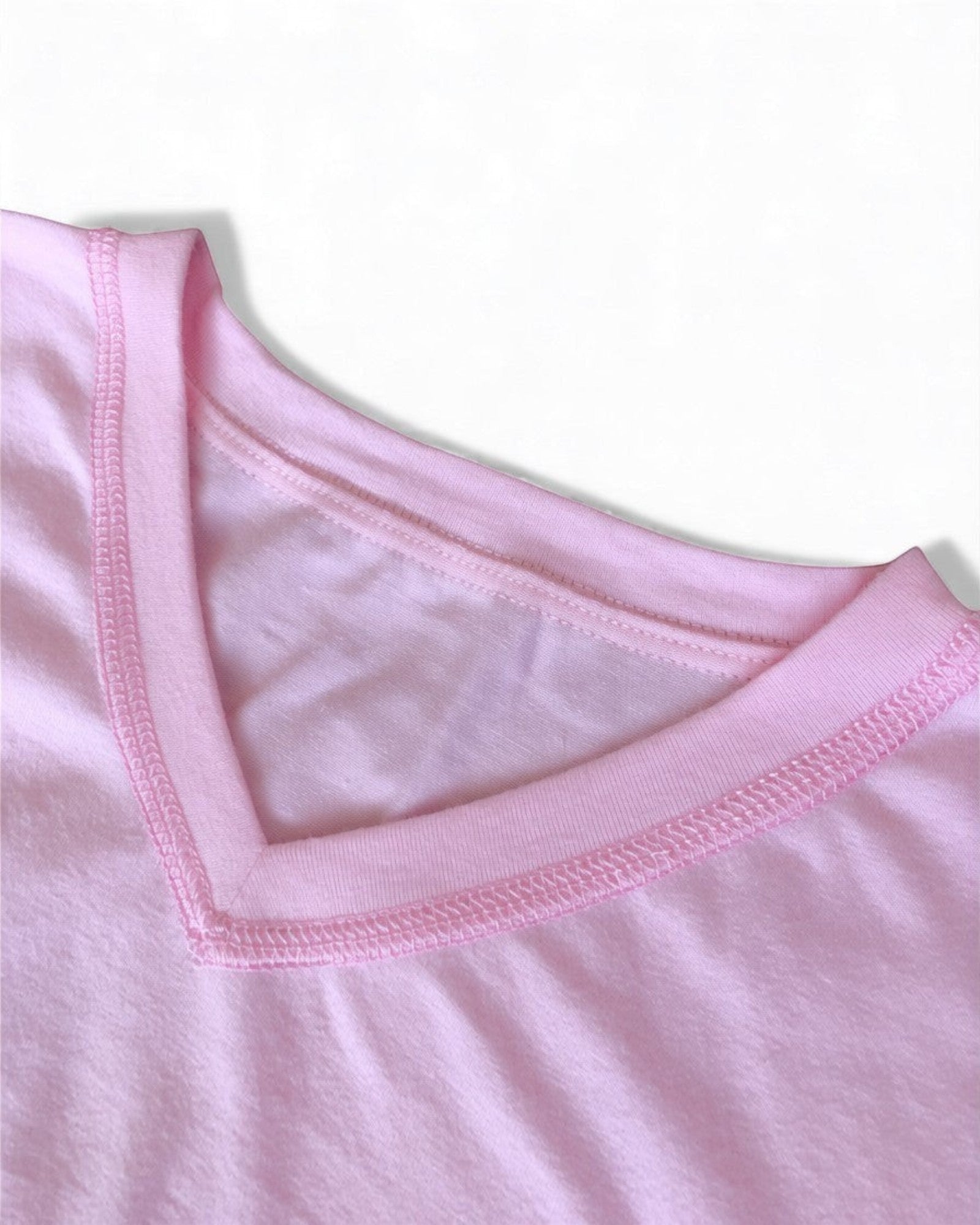 Sensitive Little Souls pink adaptive long sleeve t-shirt with V-neck and flat seams, made from cotton blend.