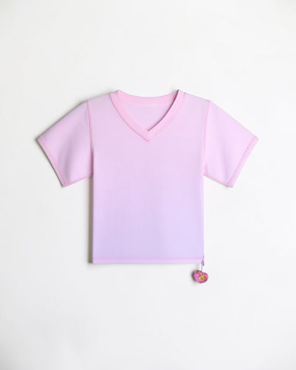 Sensitive Little Souls pink short sleeve V-neck t-shirt with fidget loop, flat seams, and tagless design for sensory comfort.