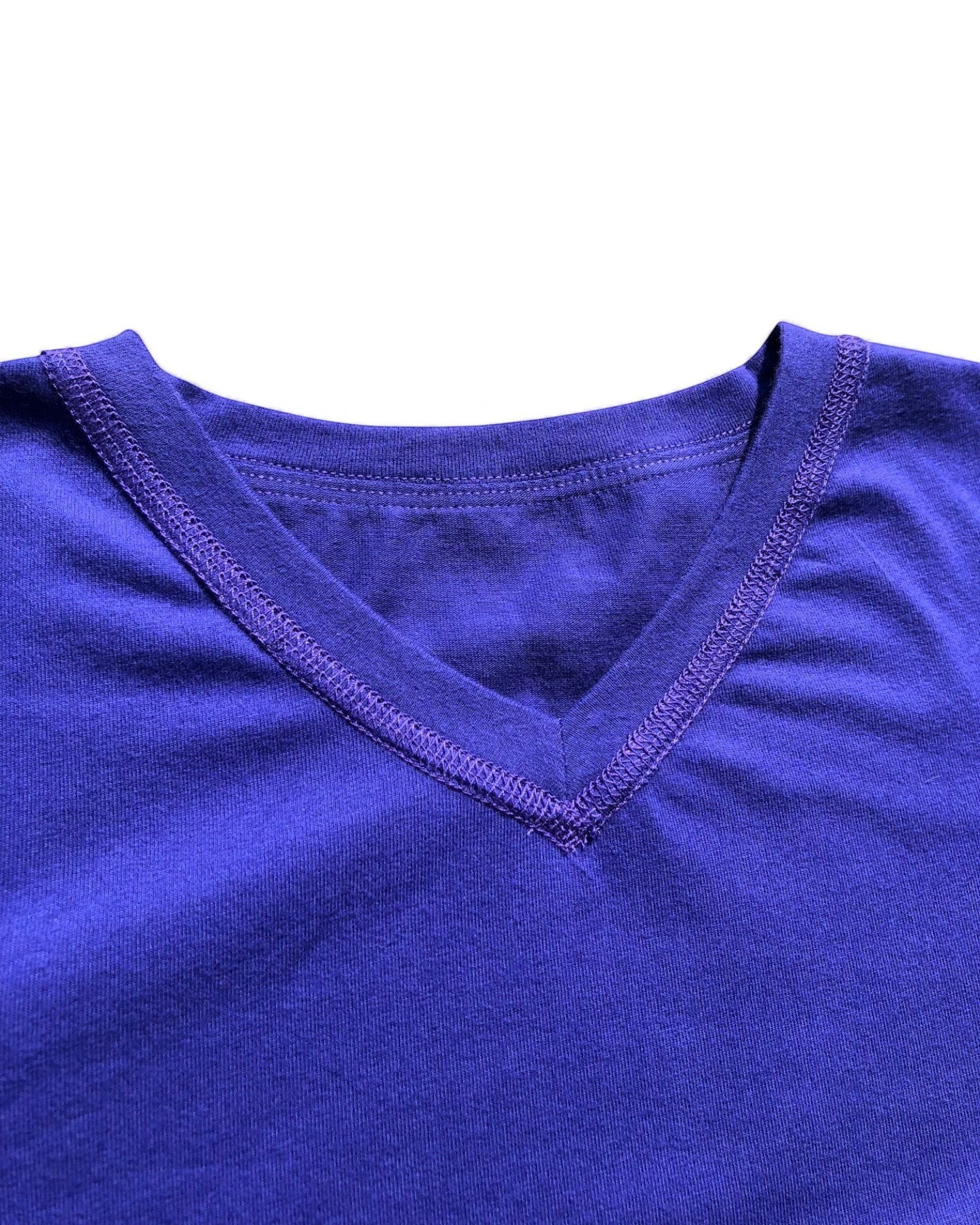 Sensitive Little Souls kids' purple short sleeve V-neck t-shirt with flat seams and fidget loop. Cotton blend.