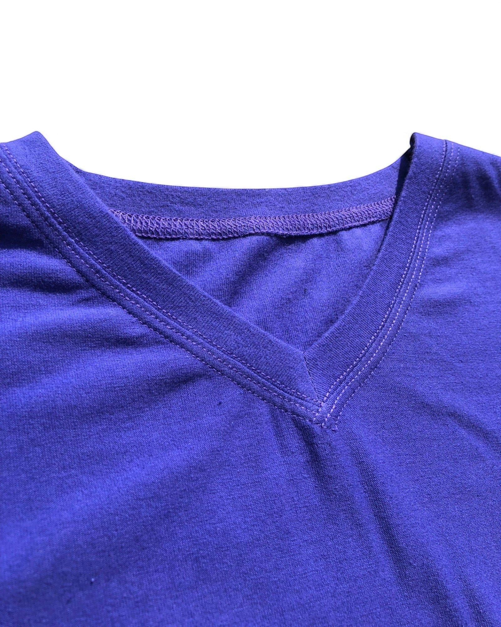 Sensitive Little Souls purple short sleeve t-shirt with V-neck, flat seams, and tagless design for sensory comfort.