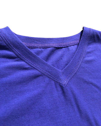 Sensitive Little Souls purple short sleeve t-shirt with V-neck, flat seams, and tagless design for sensory comfort.