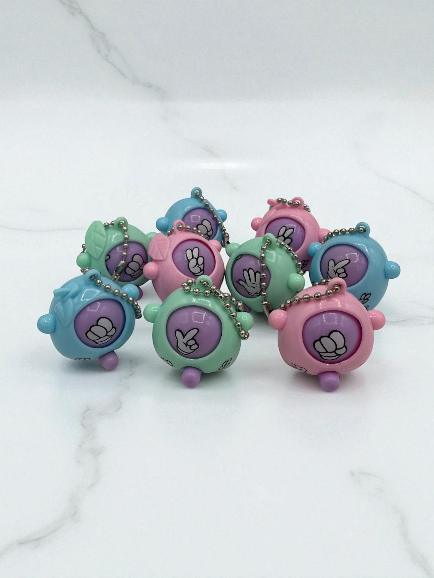 Sensitive Little Souls pastel Rock-Paper-Scissors game sensory toys with keychain. Features rock, paper, scissors hand gestures.