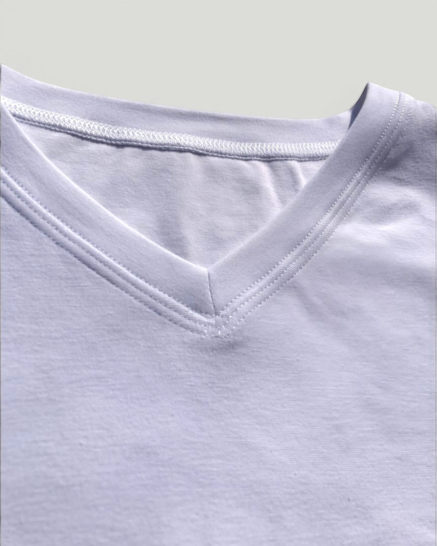 Sensitive Little Souls white cotton blend V-neck t-shirt with flat seams and tagless design.